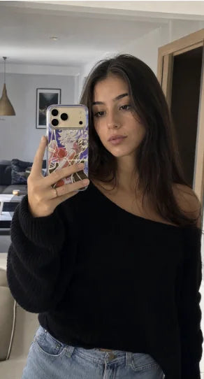 Nakama community member taking a mirror selfie with an anime case
